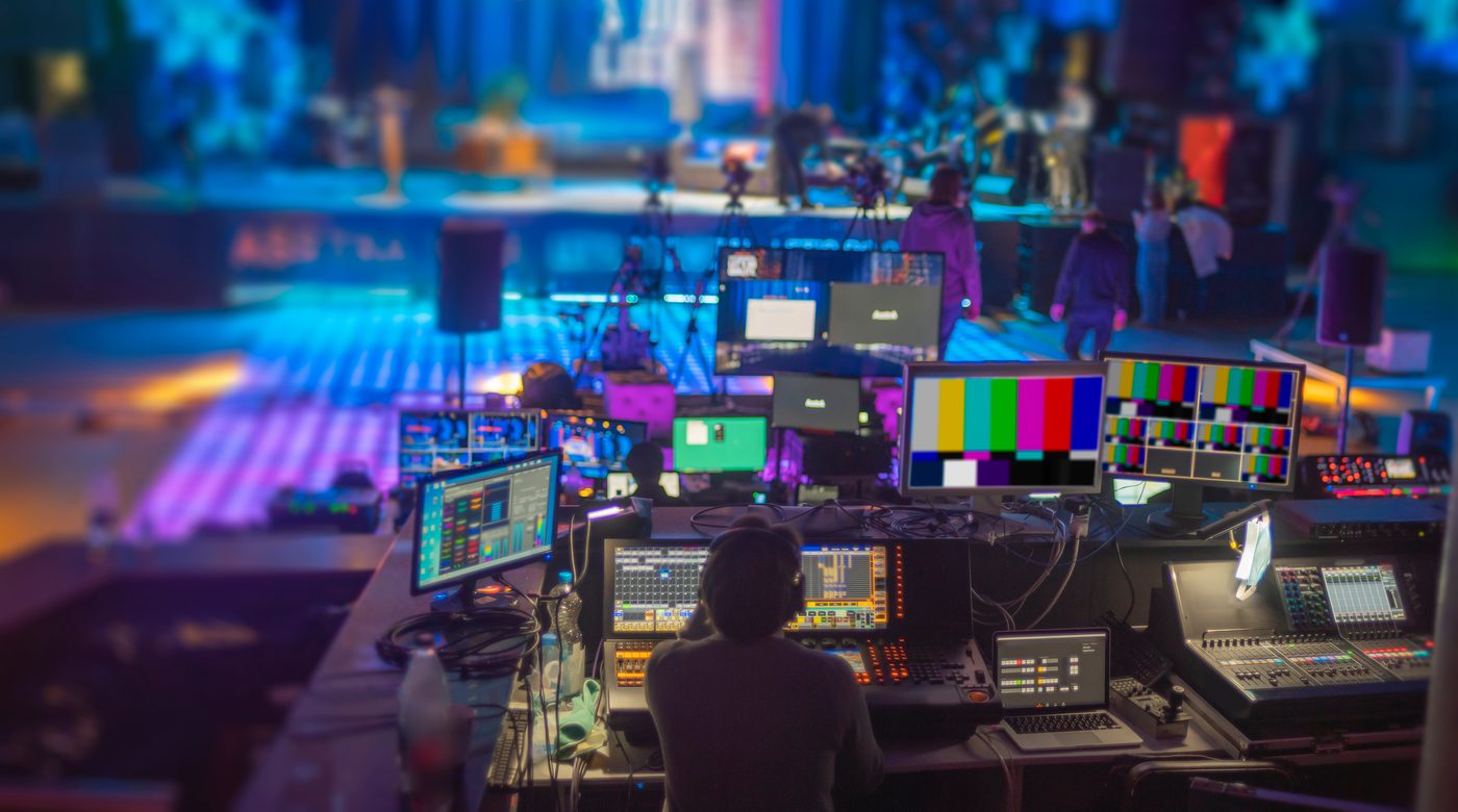 Broadcast control room with lighting and switching consoles